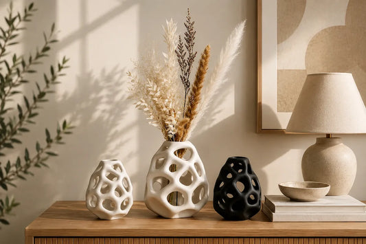 Modern dining room with a ceramic vase centerpiece and elegant 2026 home decor